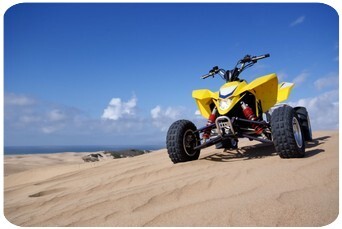 quad sur dune de sable
